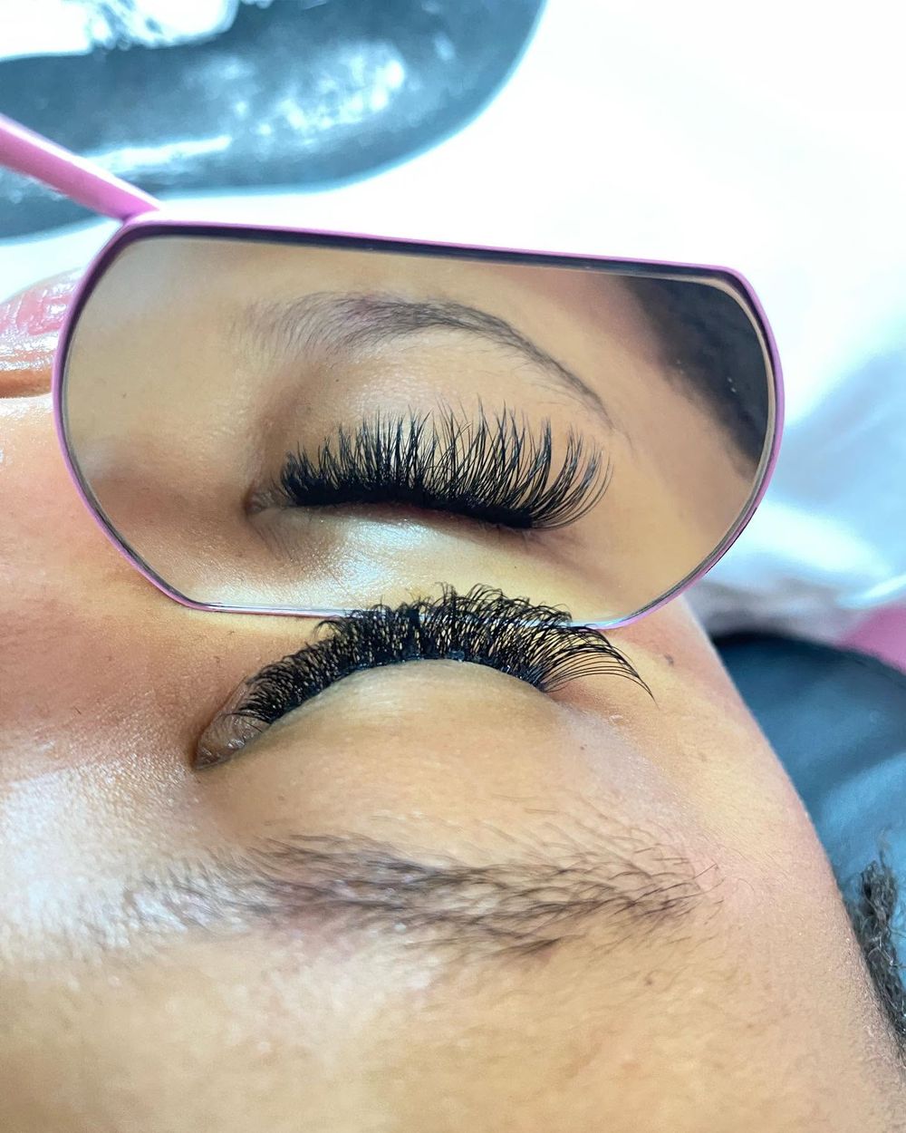 Volume lashes in a mirror